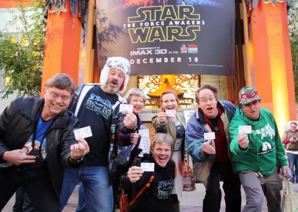 People show their tickets for the new movie in the Star Wars franchise,  The Force Awakens,  in front of a Hollywood movie theater in Los Angeles on Dec. 17, 2015, the release day of the film in the United States.