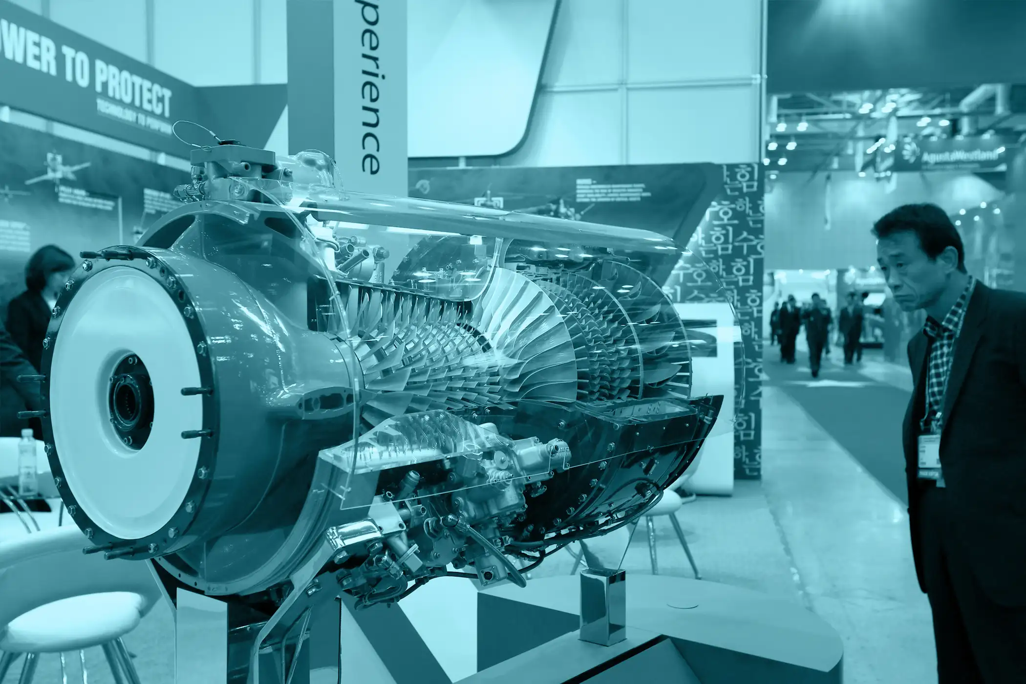 A visitor looks at a model of the Honeywell Aerospace T55 engine at the Seoul International Aerospace &amp; Defense Exhibition 2013 in Goyang, South Korea, on October 29, 2013.