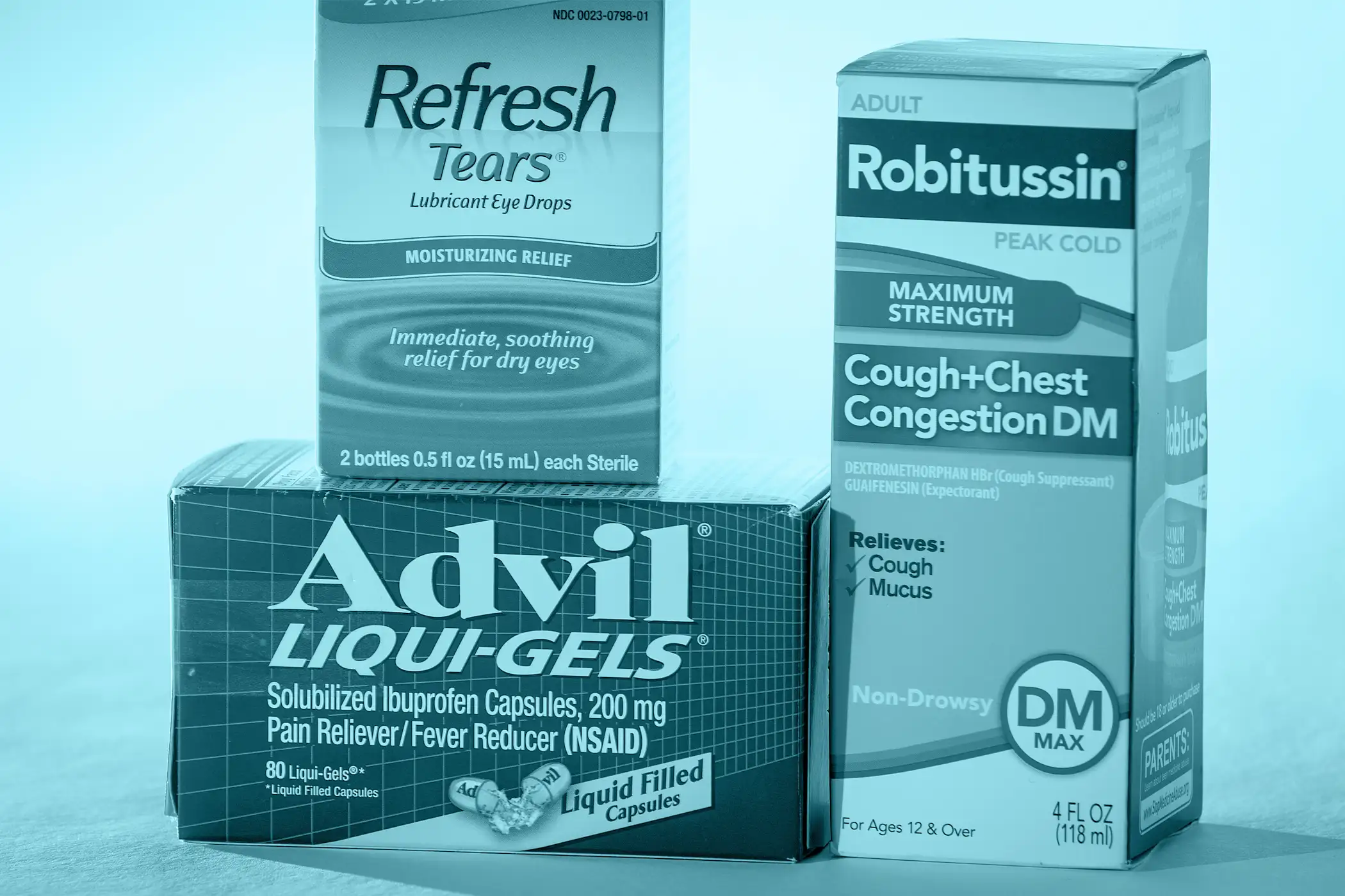 Pfizer drugs Advil and Robitussin, and Allergan's Refresh eye drops are pictured in this photo illustration in the Manhattan borough of New York October 29, 2015.