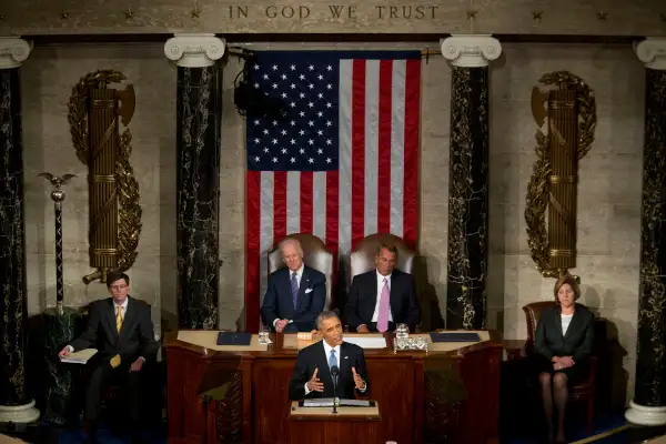 U.S. President Barack Obama, bottom, delivers the State of the Union address to a joint session of Congress as U.S. Vice President Joseph  Joe  Biden, top left, and U.S. House Speaker John Boehner, a Republican from Ohio, top right, look on at the Capitol in Washington, D.C., U.S., on January 20, 2015. Obama declared the U.S. economy healed and said the nation now must begin work to close the gap between the well-off and the wanting.
