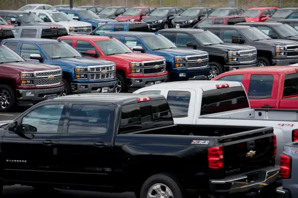 General Motors Chevrolet vehicles are displayed for sale on the lot at Phillips Chevrolet car dealership in Frankfort, Illinois, on April 30, 2015.