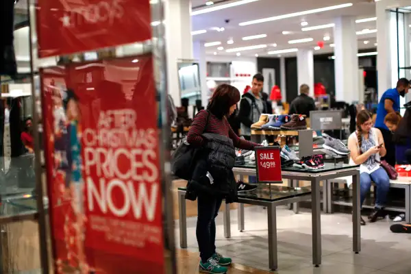 A woman looks for shoes at a Macy's store on December 24, 2015 in New York City.