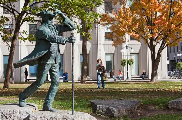 Canada, Quebec province, Montreal, the park of McGill University in autumn, bronze statue of James McGill