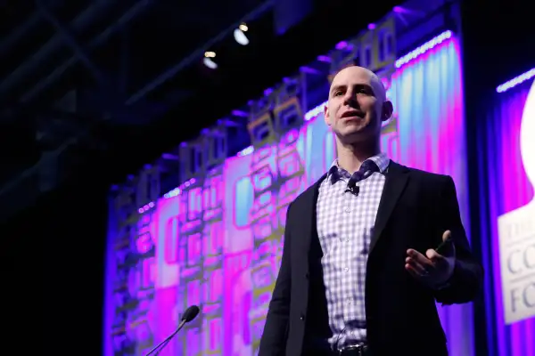 Adam Grant, teacher, Wharton School, speaks on stage during Massachusetts Conference For Women at Boston Convention & Exhibition Center on December 10, 2015 in Boston, Massachusetts.