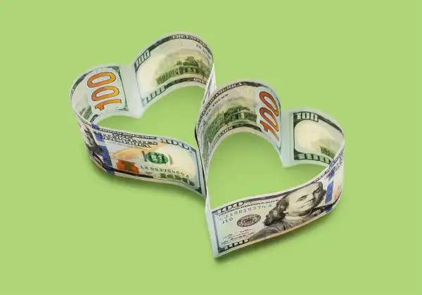 $100 bills in two conjoined hearts