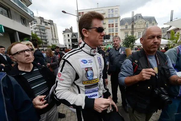 Scott Tucker of the United States and driver of the #33 Level 5 Motorsports HPD Honda during scrutineering for the 80th running of the Le Mans 24 Hour race at Place de La Republique on June 11, 2012 in Le Mans, France.