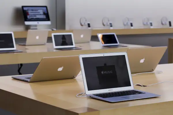 Rows of Apple laptop computers are seen at the Apple Store in Palo Alto, California November 13, 2015.