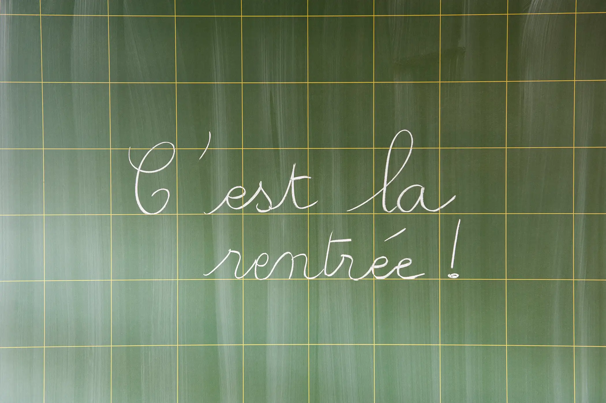 Back to School in French on chalkboard