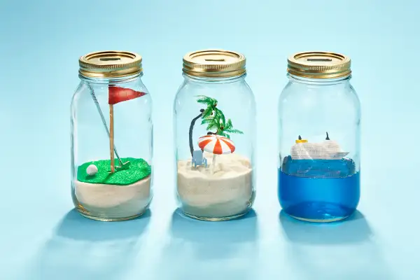savings jars with retirement scenes in them