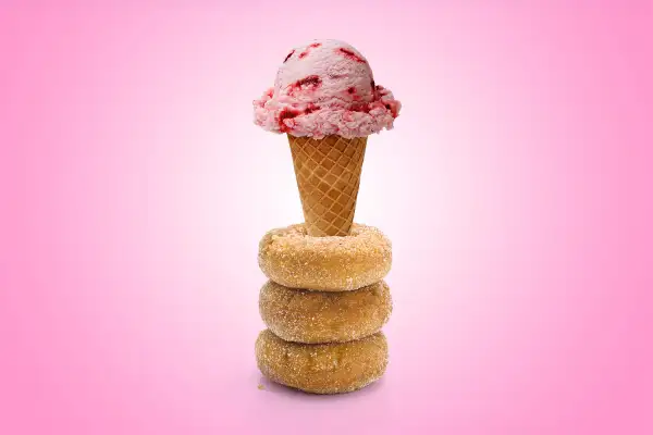 ice cream cone in stack of donuts