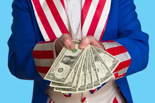 uncle sam handing money