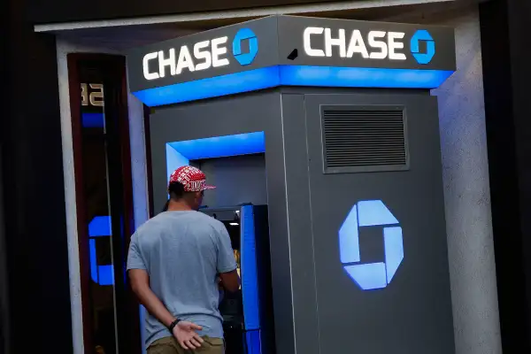 Customers use a JPMorgan Chase &amp; Co. bank ATM in the Little Tokyo neighborhood of Los Angeles, on July 7, 2015.