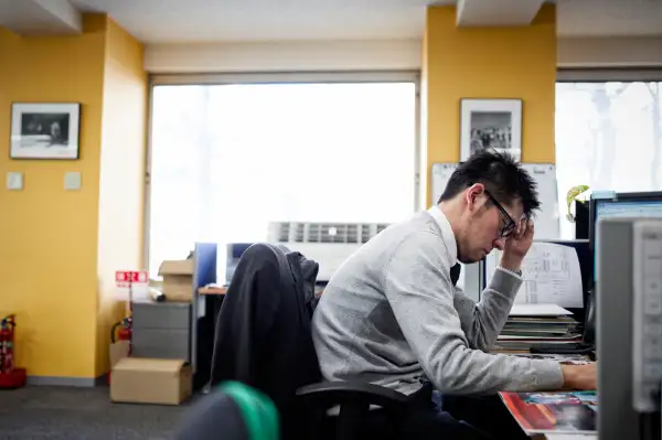 Businessmen working on a computer in the office