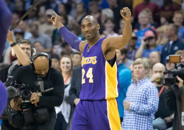 Kobe Bryant #24 of the Los Angeles Lakers greets fans before the first quarter of a NBA game against the Oklahoma City Thunder during his last road game at the Chesapeake Energy Arena on April 22, 2016 in Oklahoma City, Oklahoma.