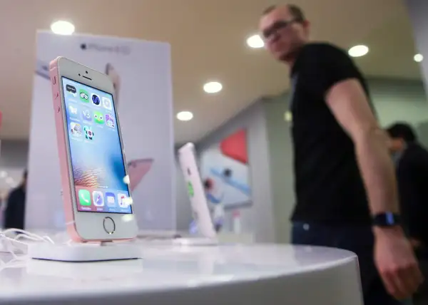 An Apple iPhone 5se at an Apple retail store in Moscow, Russia, April 5, 2016.