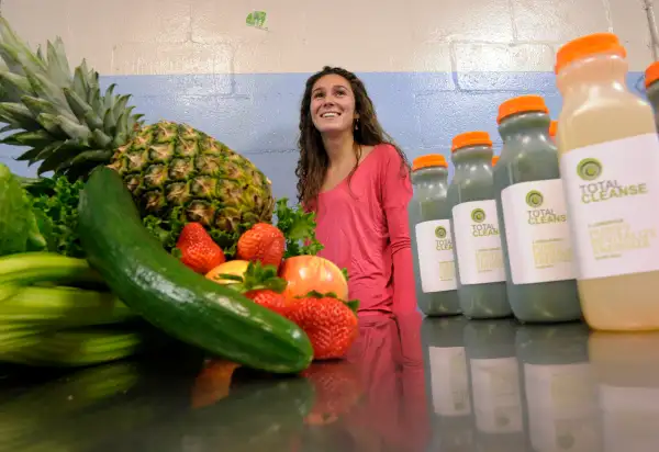 Rebecca Malen of Total Cleanse photographed in her Toronto factory. The company makes fruit and vege