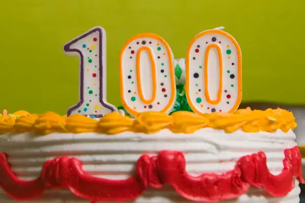 100 spelled in birthcdy candles