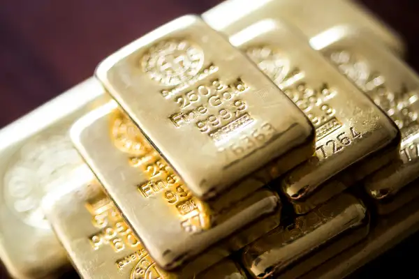 Two hundred and fifty gram gold bars sit stacked in this arranged photograph at Solar Capital Gold Zrt. in Budapest, Hungary, on Thursday, March 10, 2016. Gold advanced to the highest level in a year after the European Central Bank indicated it wouldn't cut interest rates further, boosting the euro and making dollar-denominated bullion less expensive for investors.