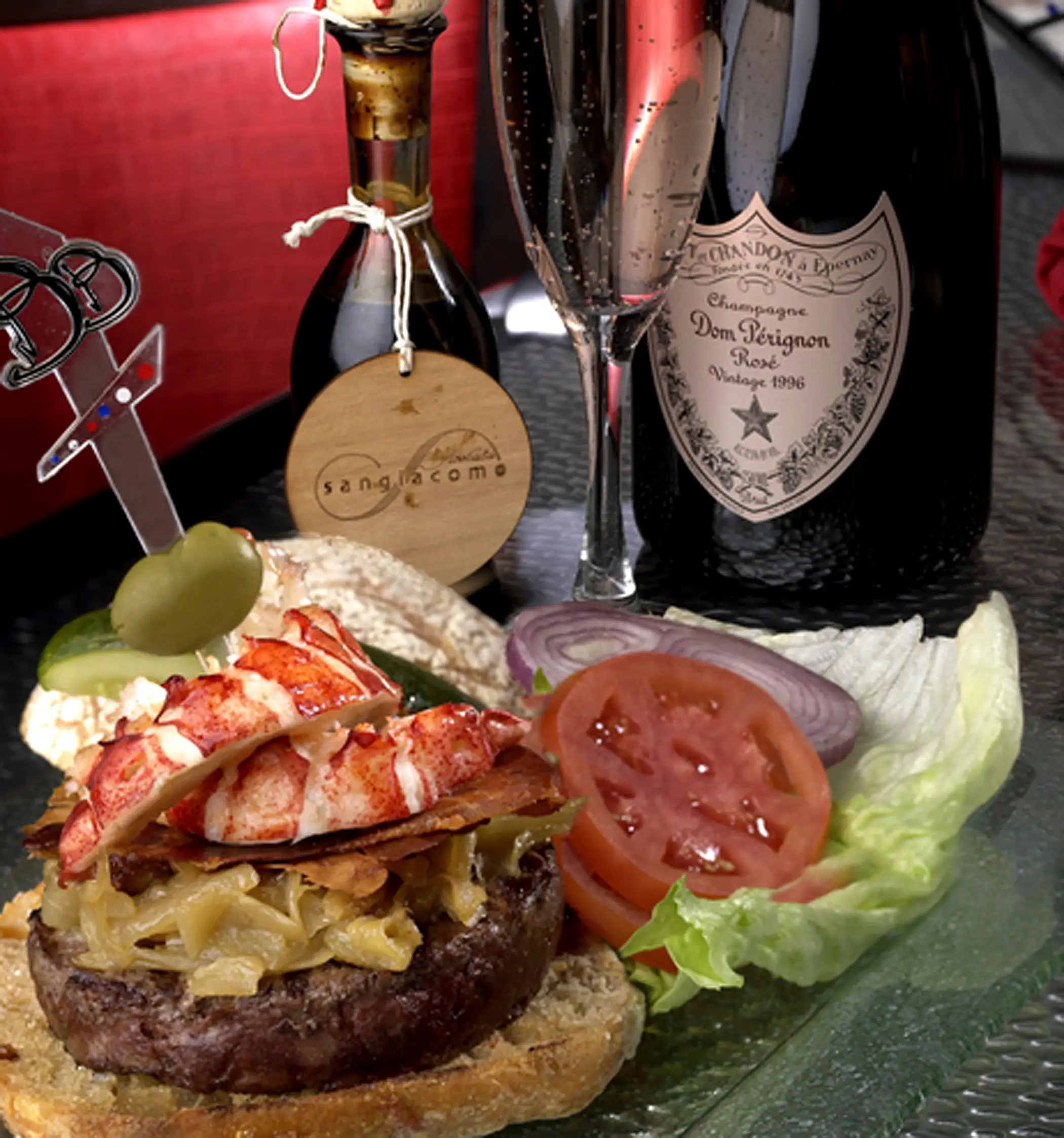 Brasserie in Paris Las Vegas, Nevada. . Consisting of Kobe Beef and fresh Maine Lobster, caramelized onions, imported brie cheese, prosciutto, 100 year aged balsamic vinegar - served with a bottle of Rose Dom Perignon champagne.