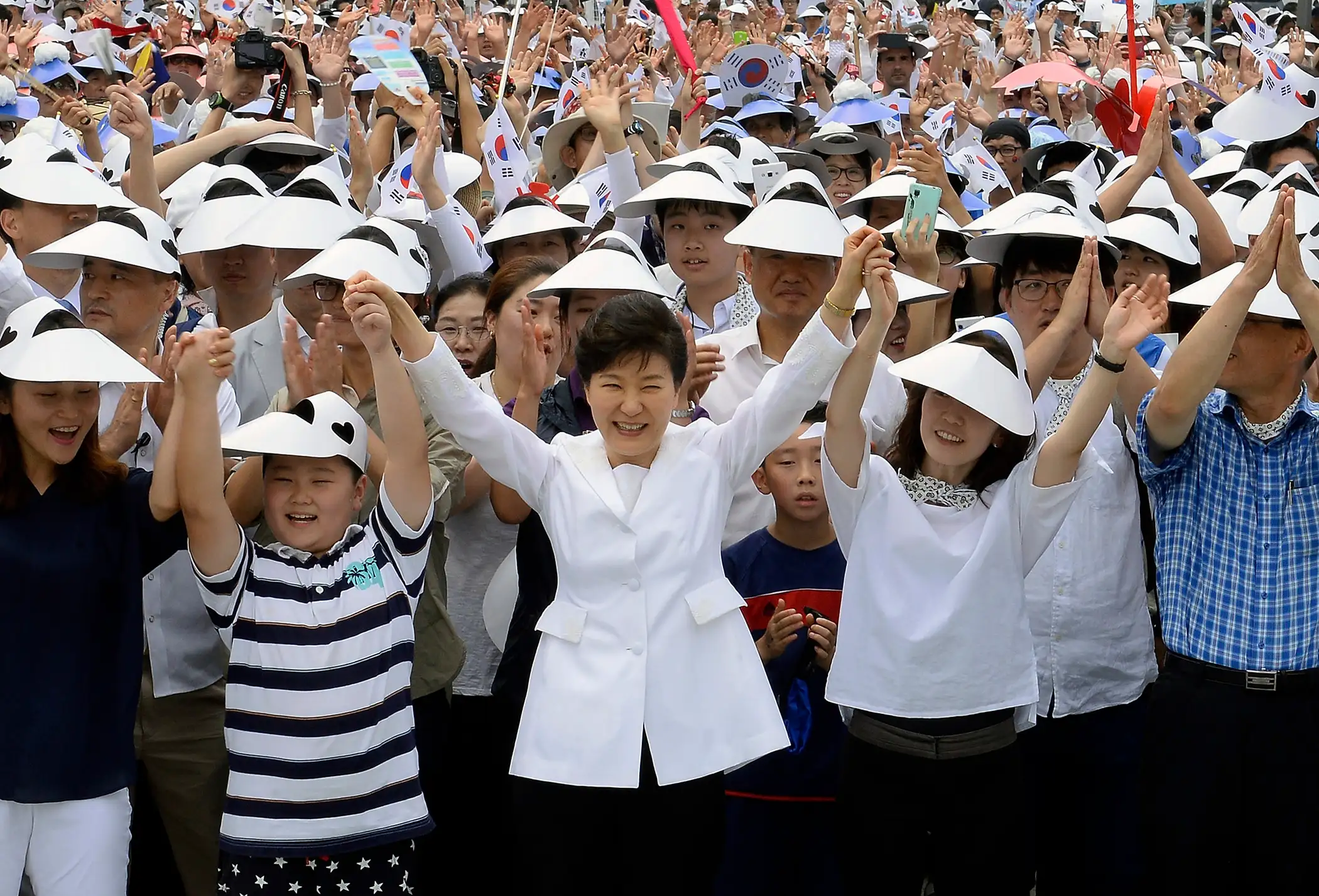 South Korean President Park Geun-Hye gives three cheers during a ceremony to celebrate the 70th Independence Day on August 15, 2015 in Seoul, South Korea. Korea was liberated from Japan's 35-year colonial rule on August 15, 1945 at the end of World War II.