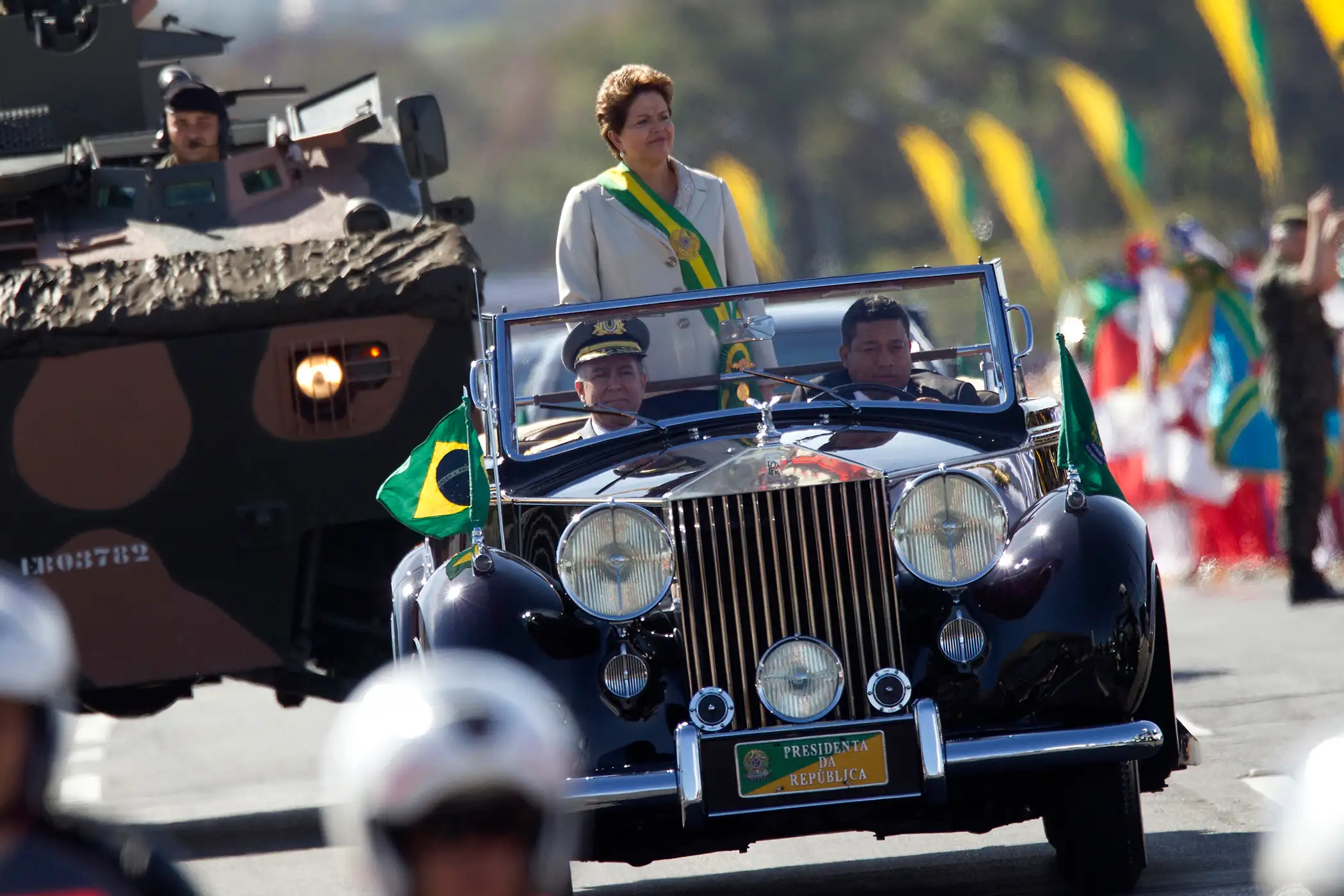 Brazil's President Dilma Rousseff stands in a vehicle during a civic-military parade commemorating of Brazilian independence Day September 7, 2012.