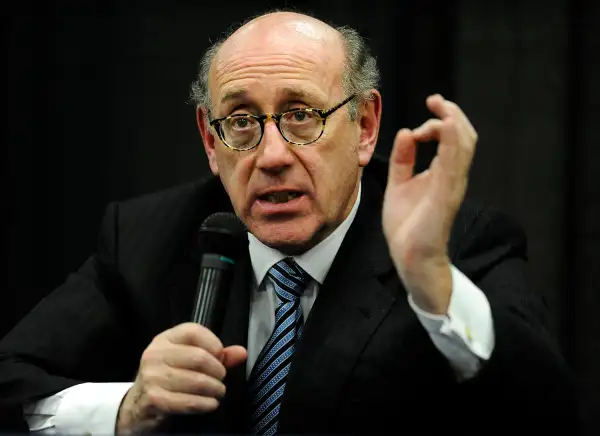 In this July 11, 2013 photo, attorney and special adviser Kenneth Feinberg speaks at a public forum on the distribution of Newtown donations at Edmond Town Hall in Newtown, Conn.