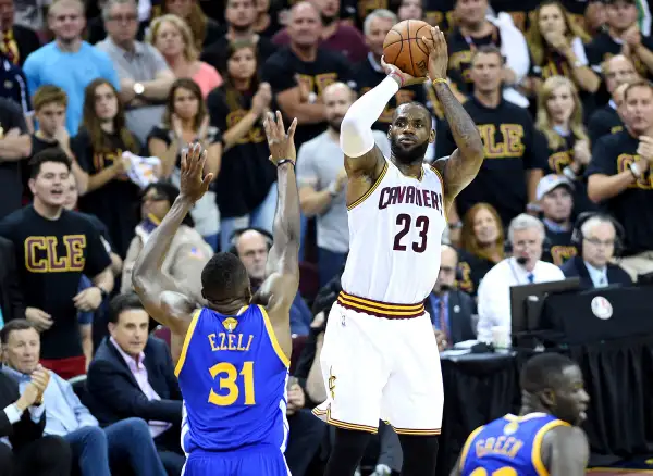 Cleveland Cavaliers forward LeBron James (23) shoots the ball against Golden State Warriors center Festus Ezeli (31) during the third quarter in game six of the NBA Finals at Quicken Loans Arena, June 6, 2016, Cleveland, Ohio.