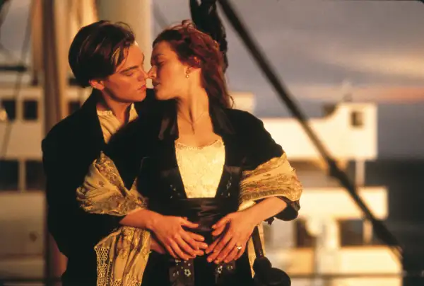 Left to right: Leonardo DiCaprio plays Jack Dawson and Kate Winslet plays Rose DeWitt in TITANIC, from Paramount Pictures and Twentieth Century Fox.