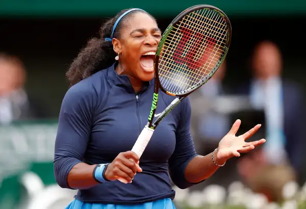 Serena Williams of the U.S. shouts as she plays Spain's Garbine Muguruza during their final match of the French Open tennis tournament at the Roland Garros stadium, Saturday, June 4, 2016 in Paris.