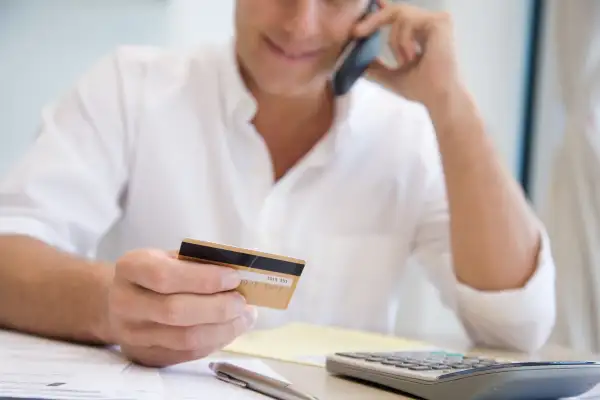 A man telephone banking