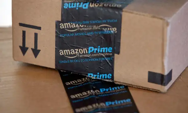 This June 4, 2014 photo shows Amazon.com boxes in Phoenix.