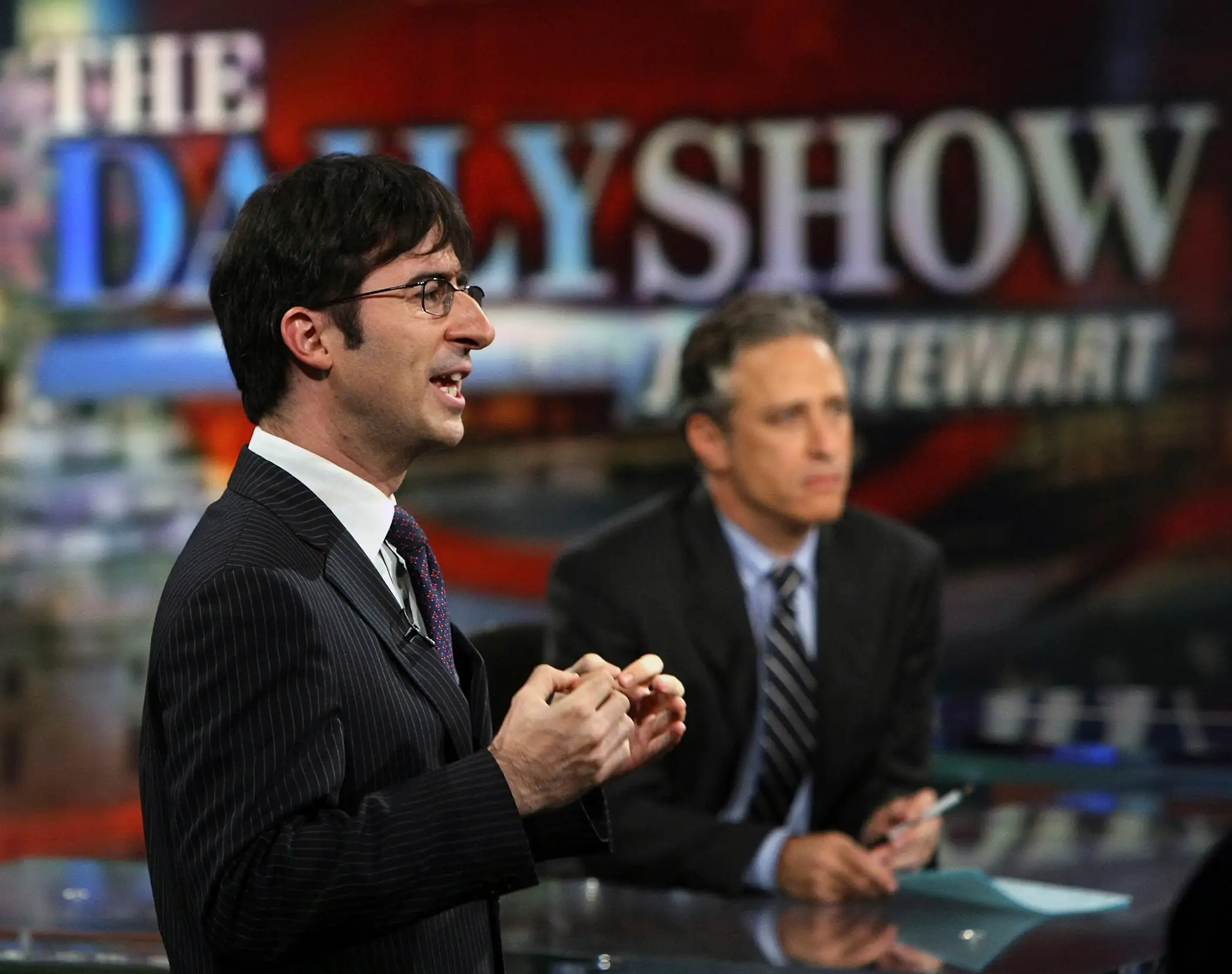 Correspondent John Oliver (L) and host Jon Stewart of Comedy Central's  The Daily Show with Jon Stewart  tape  The Daily Show with Jon Stewart: Restoring Honor & Dignity to the White House  at the McNally Smith College of Music September 3, 2008 in St. Paul, Minnesota.