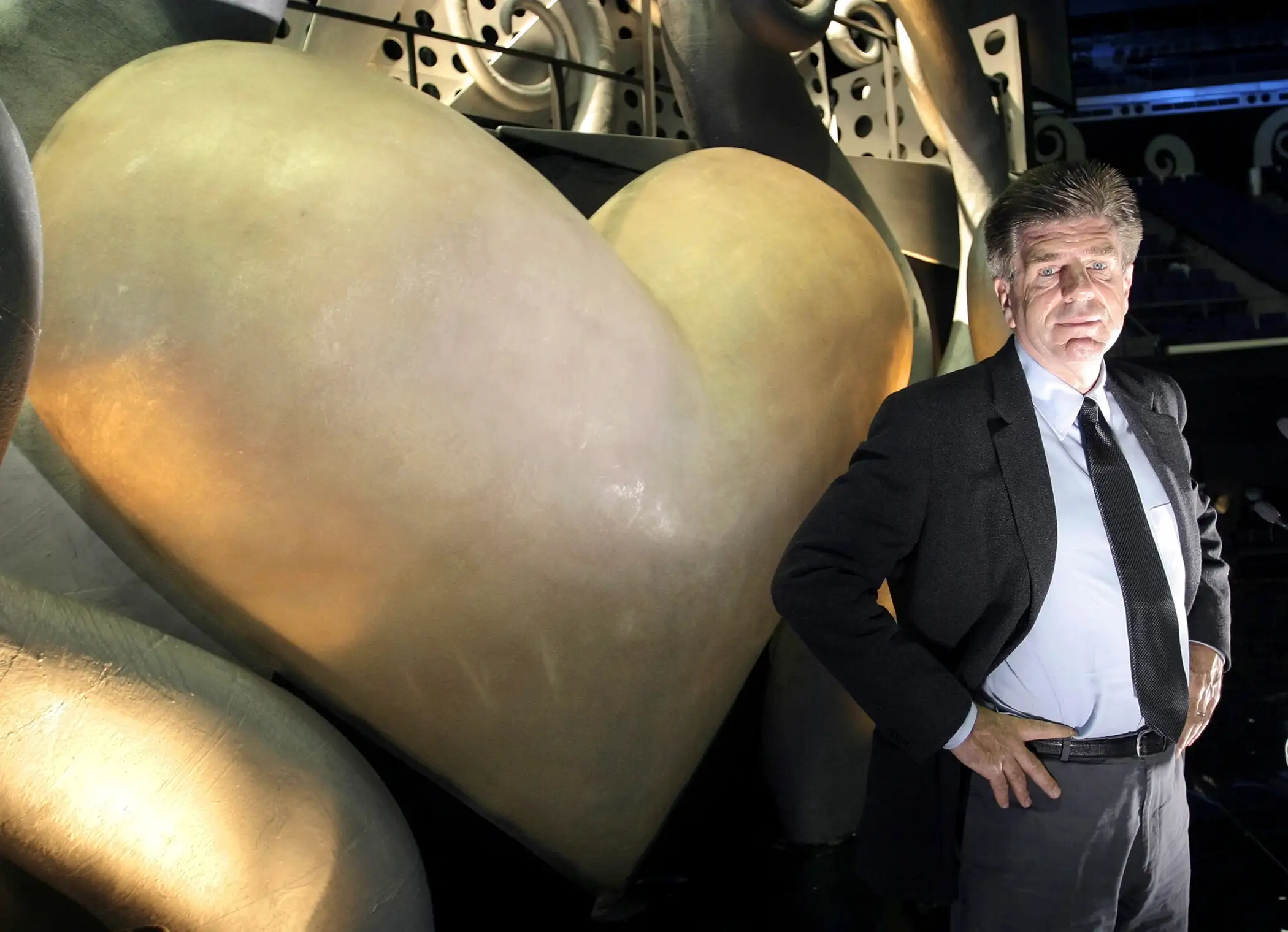 MTV Networks chairman and chief executive officer Tom Freston poses in front of a giant heart on the stage of the MTV Asia Awards in the Singapore Indoor Stadium on Friday, February 13, 2004.