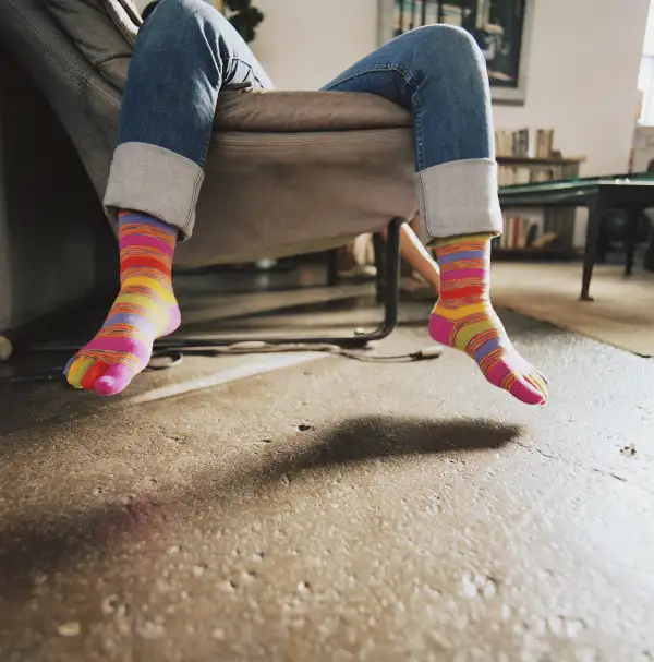 person napping on couch