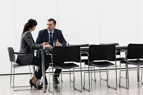 Business man and woman having a meeting