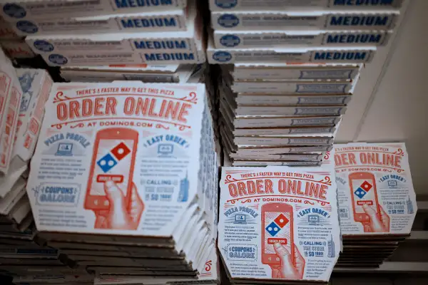 Pizza boxes sit stacked at a Domino's Pizza Inc. location in Murray, Kentucky, U.S., on Thursday,