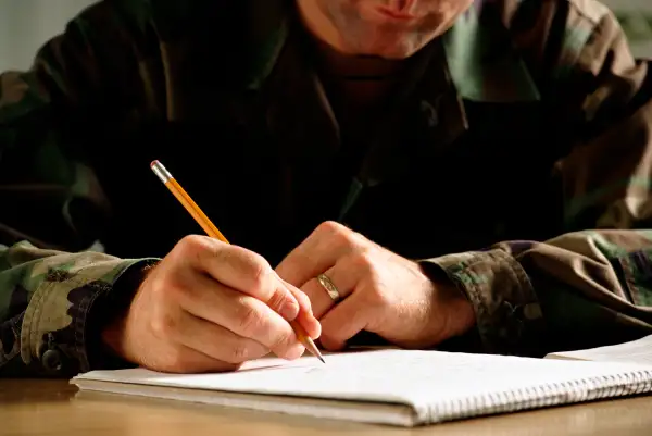 military person writing