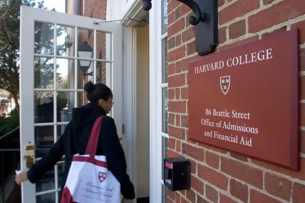 Harvard College senior Tiffanye Threadcraft enters the Office of Admissions in Cambridge, Massachusetts, Thursday, March 29, 2007.