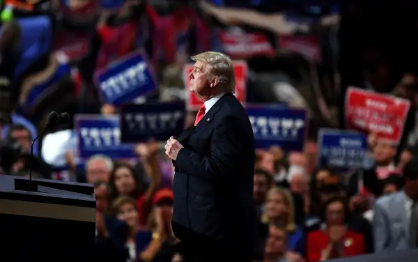 Republican presidential candidate Donald Trump pauses during his speech on the fourth day of the Republican National Convention on July 21, 2016 at the Quicken Loans Arena in Cleveland, Ohio.