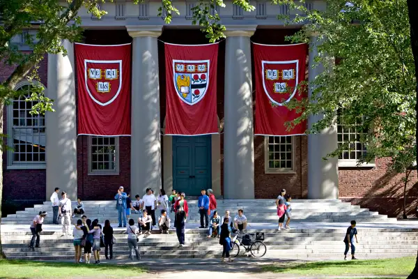 Harvard banners hang outside Memorial Church on the Harvard University campus in Cambridge, Massachusetts.