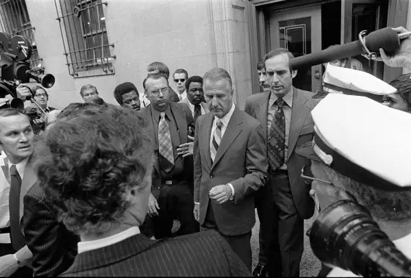 Spiro T. Agnew, center, is shown leaving court in Baltimore Oct. 10, 1973 after pleading no contest to a charge of income tax evasion. Agnew resigned from the Vice Presidency shortly after.