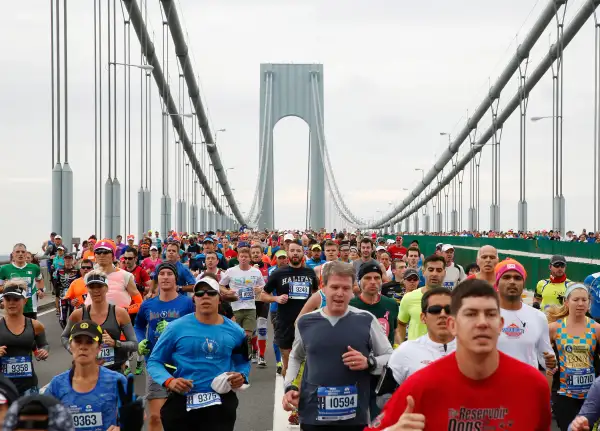 Runners cross the Verrazano-Narrows Bridge shortly after the start of the New York Cirty Marathon in New York November 1, 2015.