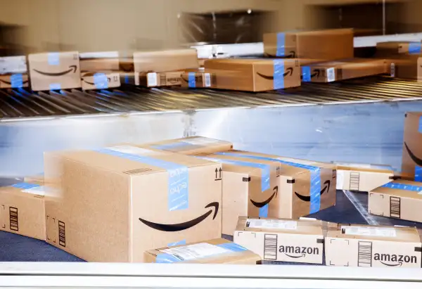Boxes move along a conveyor belt inside an Amazon.com Inc. fulfillment center