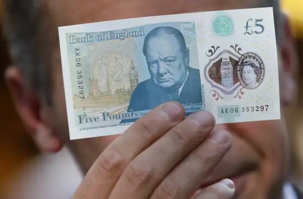 Mark Carney Makes First Transaction With New Polymer Fiver