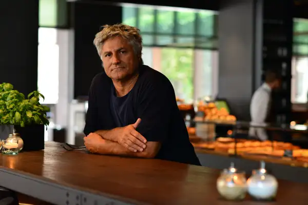 Rocco Princi, an Italian baker who has lent his brand to Starbucks, poses in one of his cafes. Starbucks' Princi cafes will serve pizza for dinner when they open.