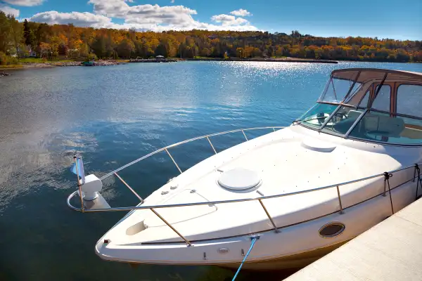 yacht on lake in fall