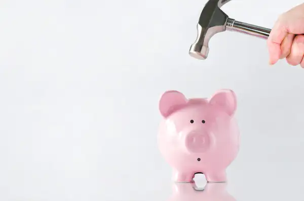 piggy bank hit with hammer