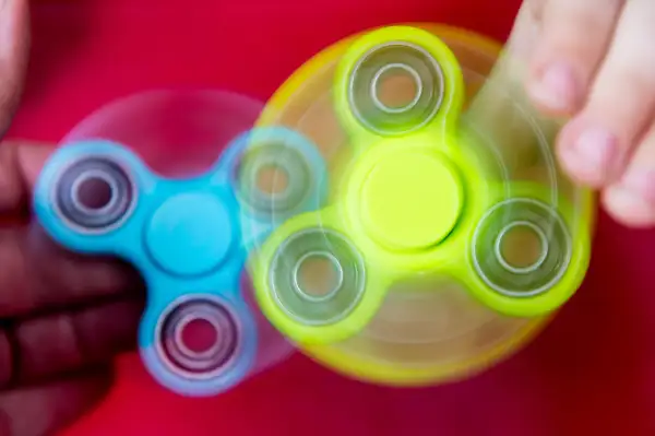 Sunday  30 April 2014 Pictured: A young boy uses a fidget spinner