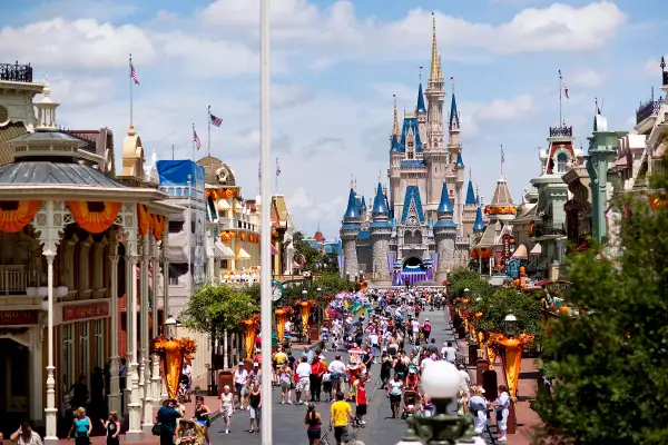 Visitors make their way toward Cinderalla Castle at Magic Ki