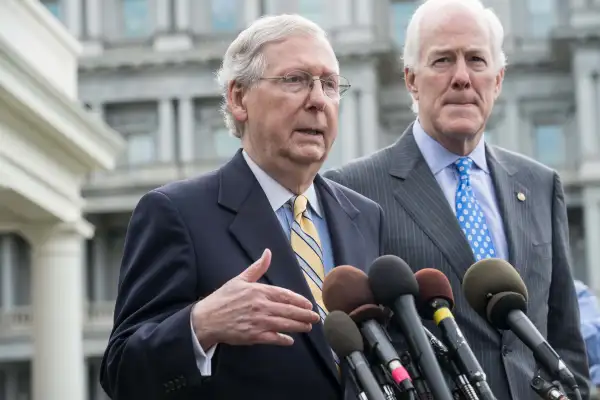 US Senate Majority Leader Mitch McConnell (L) and Majority Whip John Cornyn speak to the press outside the West Wing of the White House after Republican senators met with US President Donald Trump to discuss the healthcare bill in Washington, DC, on June 27, 2017.